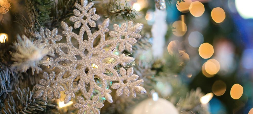 Snowflake in decorated Christmas tree